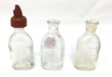 Three antique Doll-E-Toy by Amsco glass bottles