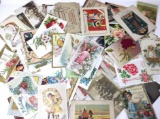 Antique postcards some with writing and postage