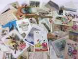 Antique postcards some with postage and writing
