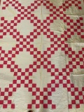 Pink and white block quilt