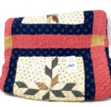 Pink and navy quilt