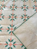 Green and orange quilt