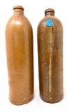 Two antique crock jugs/bottles