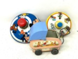Vintage tin doll buggy and two spinning tops