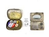 Two antique metal money cases