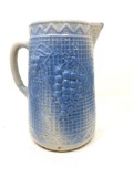 Vintage blue and gray stoneware pitcher with grapes