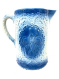 Vintage blue and white stoneware pitcher with fruit