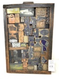 Primitive wooden picture frame with metal stamp/type plates