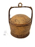Antique woven basket with handle