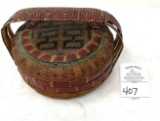 Antique woven basket with handle