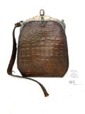 Antique leather purse with broken strap