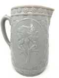 Antique stoneware grey pitcher with flower design