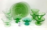 Vintage green depression plates, candle holders, and sherbets