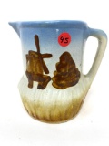 Vintage painted stoneware pitcher