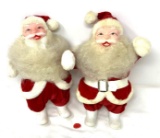 Two vintage plastic Santas