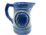 Antique salt glazed stoneware creamer with Indian