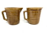 Two vintage brown stoneware pitchers