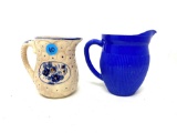 Two vintage pitchers