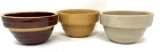 Three antique crock bowls