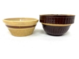 Two antique brown and tan crock bowls