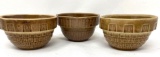 Three antique brown USA crock bowls