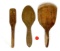 Three primitive wooden paddles