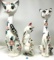 Three decorated vintage cats
