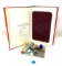 Marbles, coins, glass stopper and hideaway book
