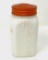 Antique milk glass shaker orange lid