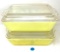 Two vintage 503 yellow Pyrex dishes with lids