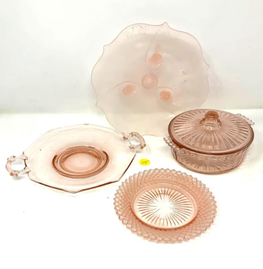 Four vintage pieces of pink depression glass