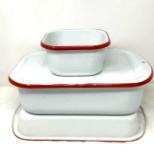 Three vintage red and white enamelware pans one lid
