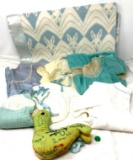 Antique baby clothes and quilt