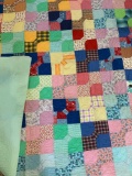 Bowtie quilt, hand quilted many colors