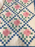 Blue pink and green hand sewn quilt