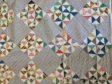 Hand quilted pinwheel quilt