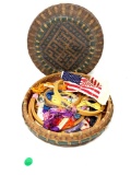 Antique basket with embroidery hoops and floss