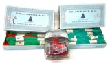 Two boxes of antique embroidery floss and a glass jar of red buttons
