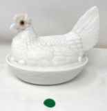 Vintage milk glass and hen on nest