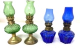 Four antique blue and green finger lamps