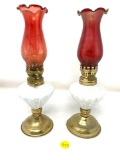 Two antique milk glass oil lamps