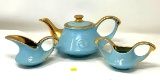 Blue and gold tea pot, cream and sugar