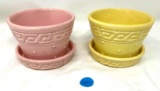 Two McCoy flower pots, pink and yellow