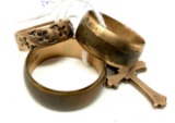 Three brass band rings and cross