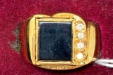 Men?s gold ring with black stone