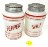 Antique milk glass salt and pepper with red bands