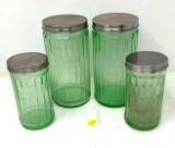 Four vintage green depression spice jars