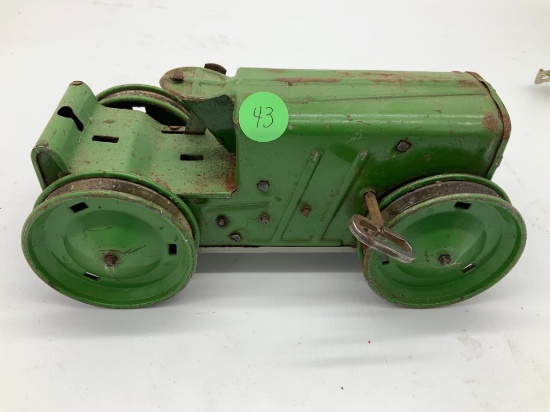 Antique wind up tractor