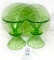 Three vintage 8 in. uranium green depression, plates, and forks sherbets