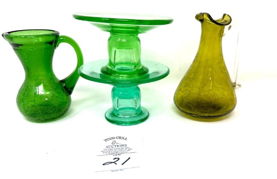 Two small vintage pitchers and uranium glass candleholders